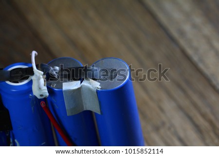 laptop batteries on wooden parquet