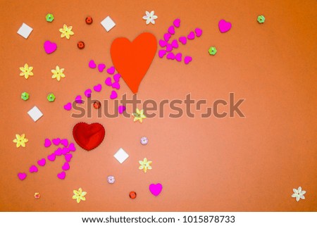 Valentines day card with hearts and dragonflies on colored background