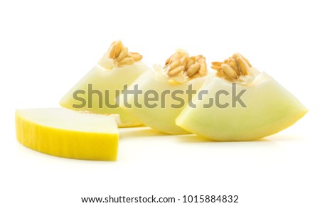 Yellow honeydew melon four cut pieces isolated on white background
