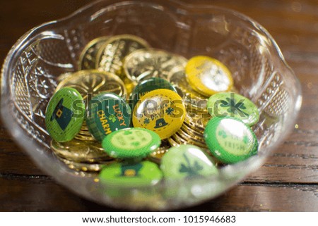Gold coins and St. Patrick's Day buttons