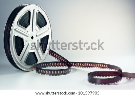 Old motion picture film reel Royalty-Free Stock Photo #101597905