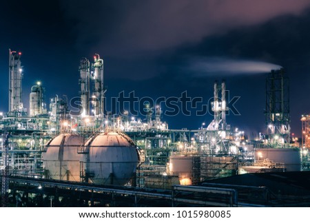 Glitter lighting of petrochemical plant with night, Manufacturing of petroleum, Products tank in petrochemical plant Royalty-Free Stock Photo #1015980085
