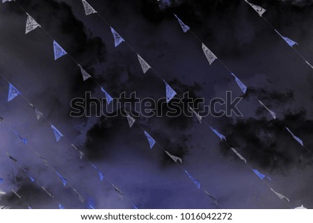 flags on the background of a stormy sky