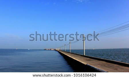 Small bridge to fishing pier.In the fishing village