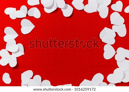 valentines day, heart made of white paper on a background of red cloth, place for text, flat, horizontal