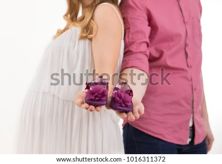 Young couple waiting for their baby daughter
