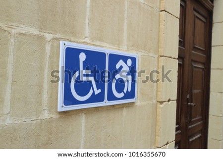 funny fast handicapped person sign closeup