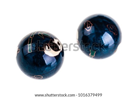Chinese Baoding balls or medicine balls isolated over a white background