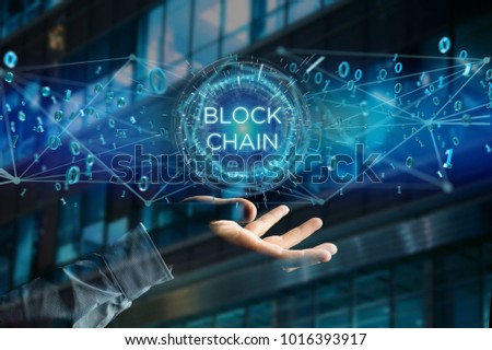 View of a Blockchain title with 0 and 1 data flying over Royalty-Free Stock Photo #1016393917