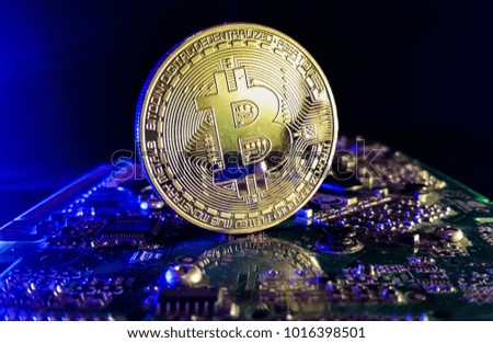 Bitcoin - close up shot in a computer technology environment