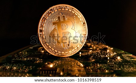 Bitcoins - the new modern currency for bitcoin payments - close up shot