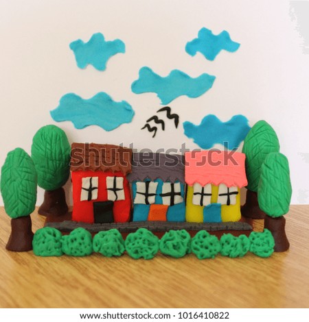 Make house picture with play dough.