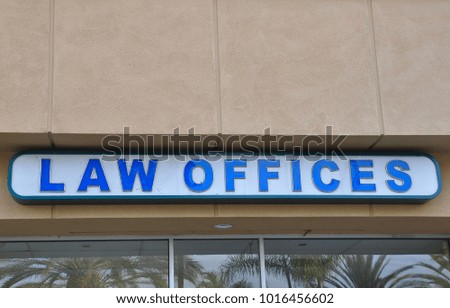 Law offices signage in front of the building
