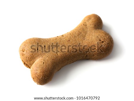 Bone shaped dog biscuit isolated on a white background Royalty-Free Stock Photo #1016470792