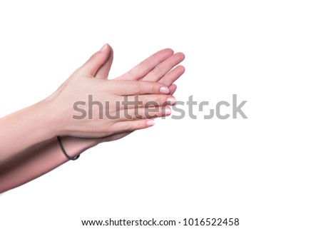 woman rubbing palms of her hands isolated on white background