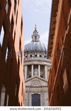 St. Paul`s Cathedral. London. View between two building.