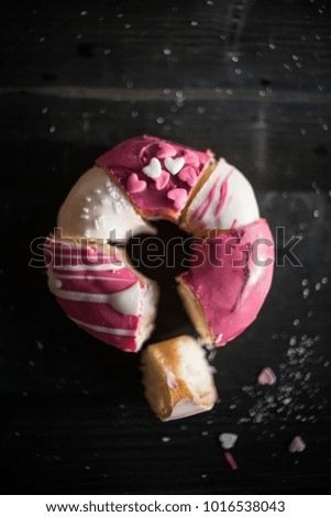 Sliced pieces of donuts put togheter,selective focus 
