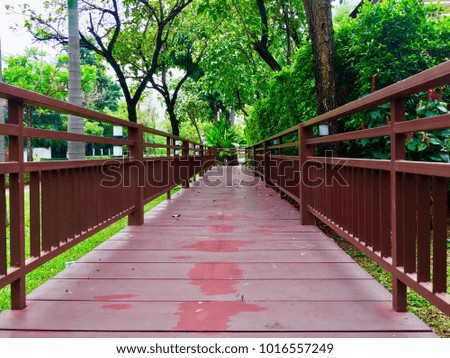 Balinese style wooden walkway, Perspective Wooden walkway in the garden and in the spa.