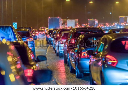 Night view busy UK Motorway traffic jam at night Royalty-Free Stock Photo #1016564218