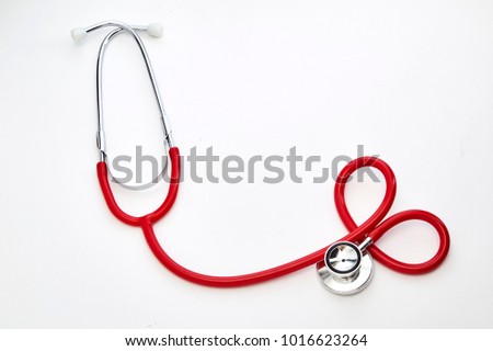 Red Curled Stethoscope Isolated on White Background