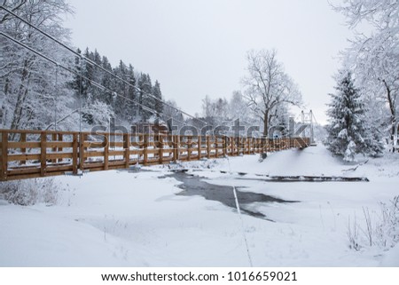 Zvartas bridge and river at city Cesis. Winter, cold and many snow. Travel photo. 2016
