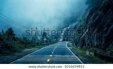 mountain road in fog in the summer