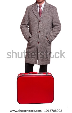 man hand holding suitcase on white background