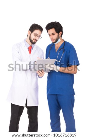 A doctor and surgeon checking the case from the clipboard focus, isolated on a white background.