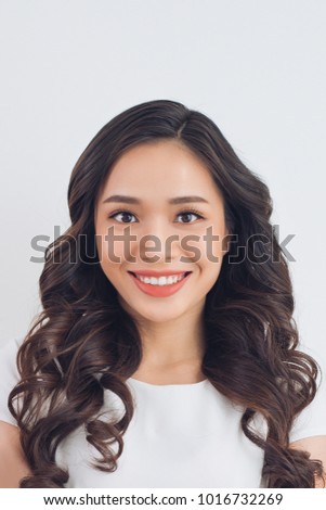 Passport picture of an asian young woman.