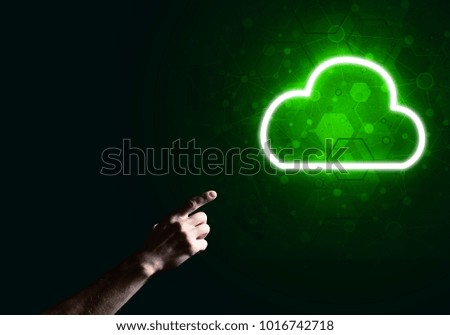 Male hand pointing to the luminous cloud computer concept