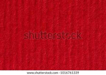 Blank textured red paper background. High resolution photo.