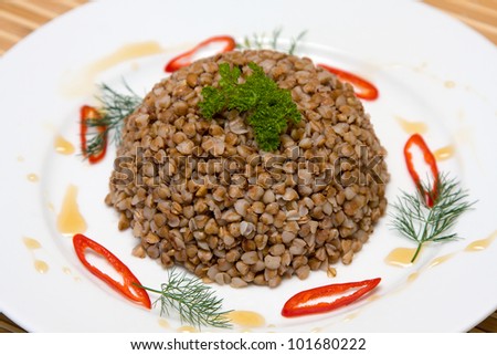 Food background. The boiled buckwheat porridge closeup.