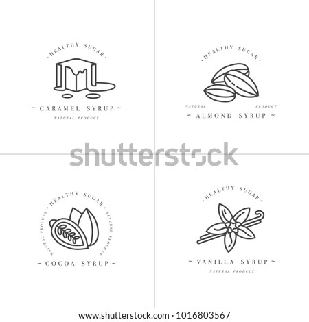 Vector set design monochrome templates logo and emblems - syrups and toppings-caramel, almond, cocoa, vanilla. Food icon. Logos in trendy linear style isolated on white background Royalty-Free Stock Photo #1016803567