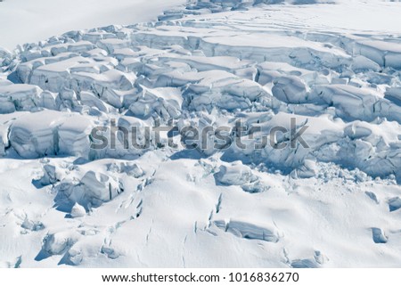 Fox glacier snow close up view from helicopter, New Zealand winter season natural landscape
