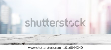Empty White Stone table top and blur glass window wall building banner mock up background - can used for display or montage your products.