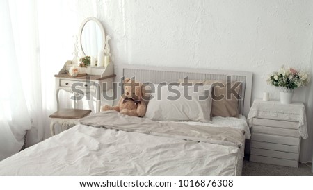Bedroom of my dream. Tracking shot of elegant bedroom in a stylish, classically designed home with a contemporary feel No people 4k Royalty-Free Stock Photo #1016876308