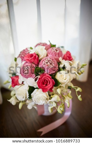 mix pink lotus,white roses and red rose bouquet with white curtain background