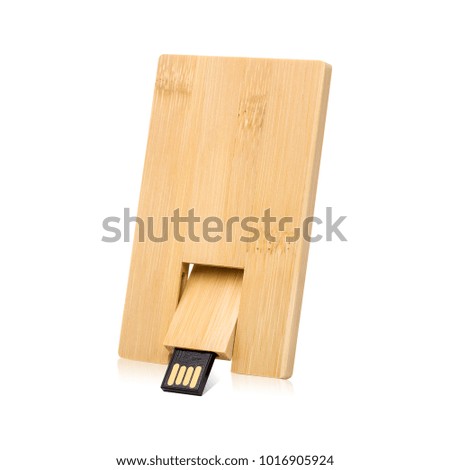 Wooden flash drive isolated on white background. USB stick made from wood material in card concept style. ( Clipping path )