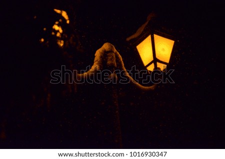 winter snow and light of lanterns