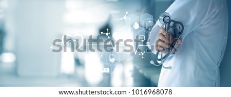 Medicine doctor with stethoscope in hand and icon medical network connection on  virtual screen interface. Modern medical technology and innovation concept Royalty-Free Stock Photo #1016968078