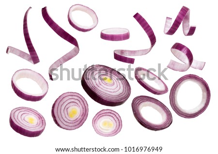 Sliced red onion isolated on white background. Set of red onion slices isolated on a white background.  Closeup Royalty-Free Stock Photo #1016976949
