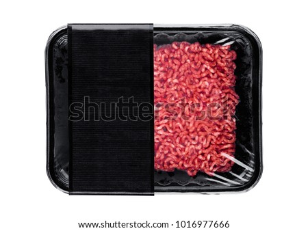 Plastic tray with raw fresh beef minced meat on white background
