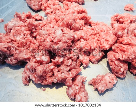 Close up, raw and fresh minced pork in supermarket with space for your text and design. Concept be used for product in fresh market and present about fresh market business. Blur picture.