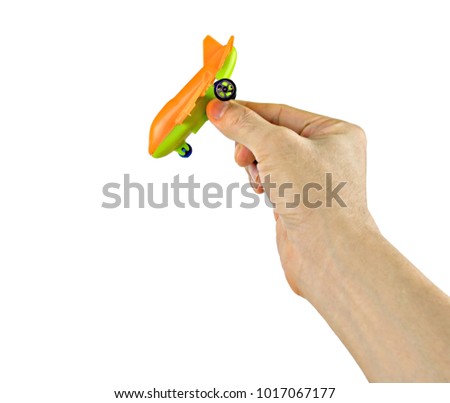 Hand holding Toy Plane isolated on white background with clipping path.Concept plane accidents.