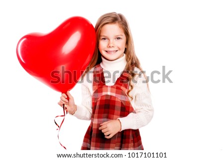 Smiling girl in red plaid dress with red heart balloon isolated on white background. Happy Valentine's Day. Happy mother's day. 
