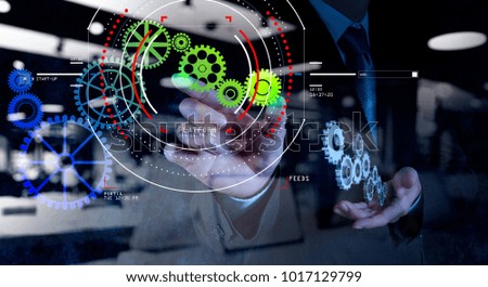 Concept of target focus digital diagram,graph interfaces,virtual UI screen,connections netwoork.Hipster finance analist working at trendy office