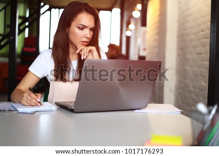 Hipster Woman use Laptop huge Loft Studio.Student Researching Process Work.Young Business Team Working Creative Startup modern Office.Analyze market stock,new strategy.
