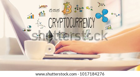 Cryptocurrency with woman using a laptop in brightly lit room