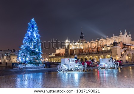 Krakow, Poland, Christmas tree and Cloth Hall on Main Market square