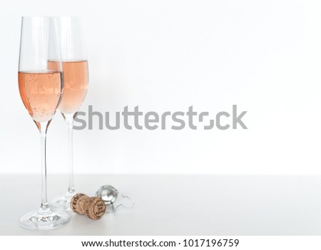 Cheers! Get festive with this simple champagne mockup. Champagne isn't just for New Year's, you know! This stock image is season-less. Use it for any celebration or announcement.